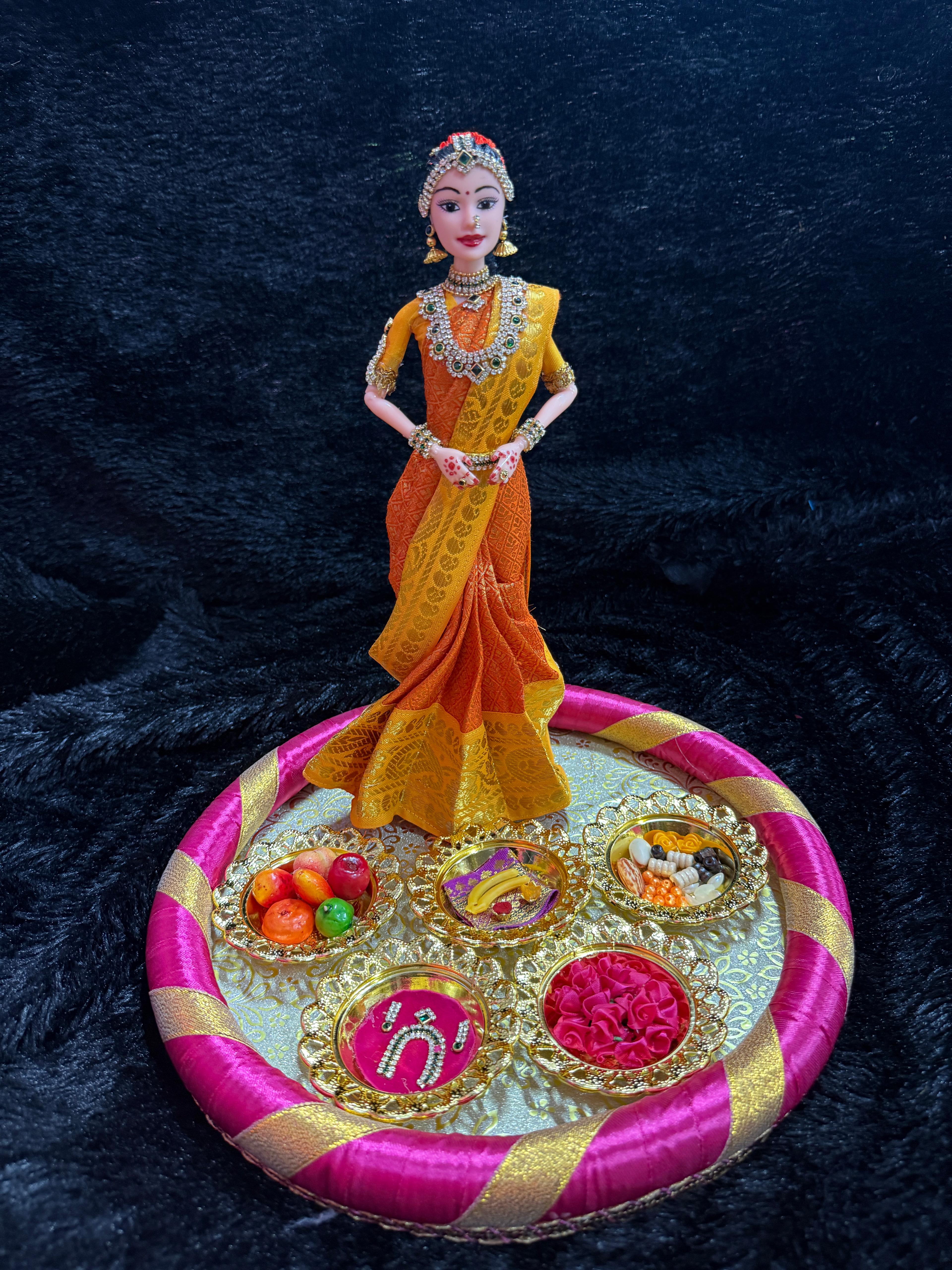 Saree doll full set    Available colour -red with green border Yellow with royal blue border Orange with yellow border Parrot green with pink border   Base plate size -12 inches  Doll size -12 inches | 5  plates with miniatures